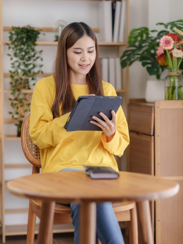 beautiful-asian-business-woman-working-at-home-using-digital-tablet-with-peace-of-mind--q33flvj5tro8kyd85aoofbhgaqa2ezyuqpnb022dz4